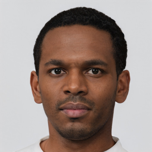 Neutral black young-adult male with short  black hair and brown eyes