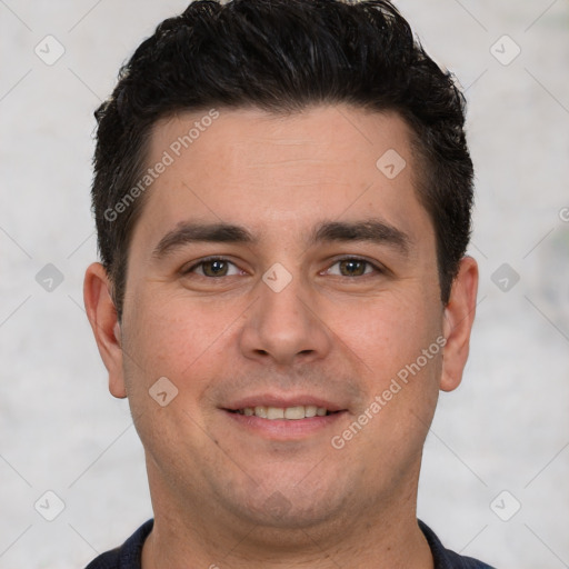 Joyful white young-adult male with short  brown hair and brown eyes