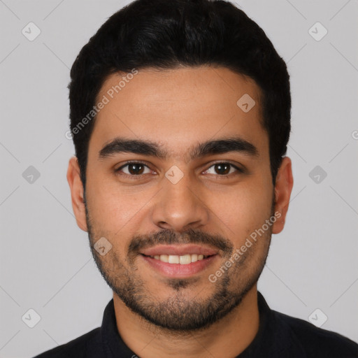 Joyful latino young-adult male with short  black hair and brown eyes