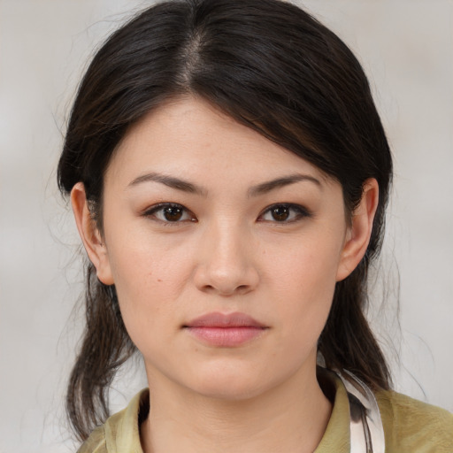 Neutral white young-adult female with medium  brown hair and brown eyes