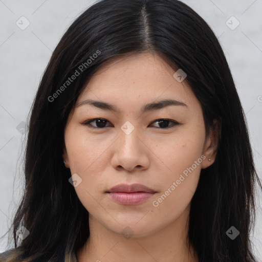 Joyful asian young-adult female with long  brown hair and brown eyes