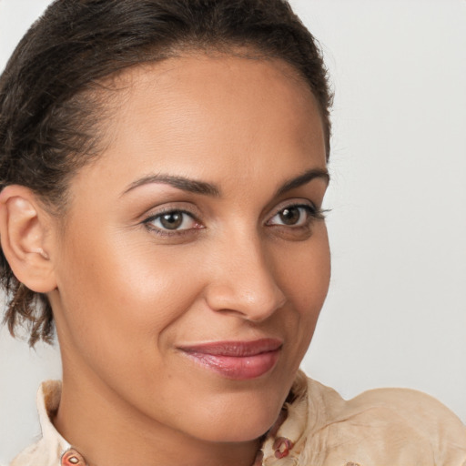 Joyful latino young-adult female with short  brown hair and brown eyes