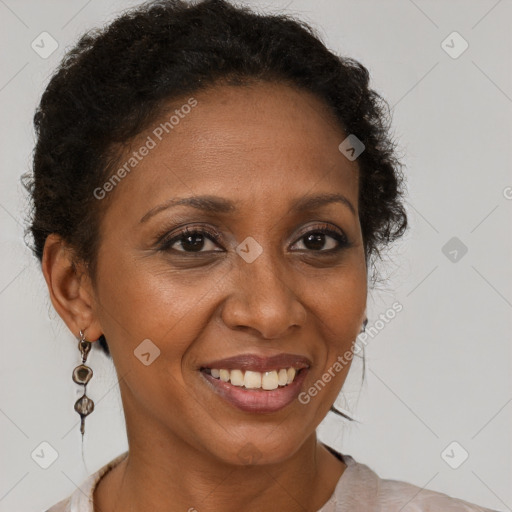 Joyful black adult female with short  brown hair and brown eyes