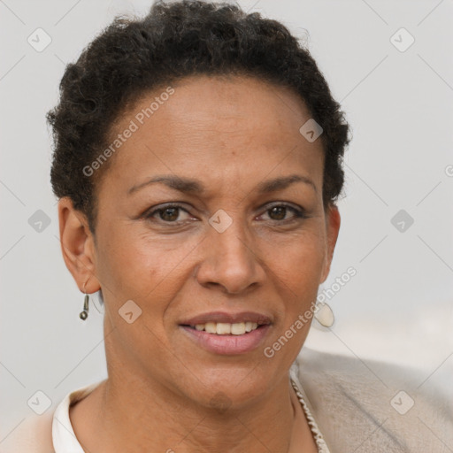 Joyful black adult female with short  brown hair and brown eyes