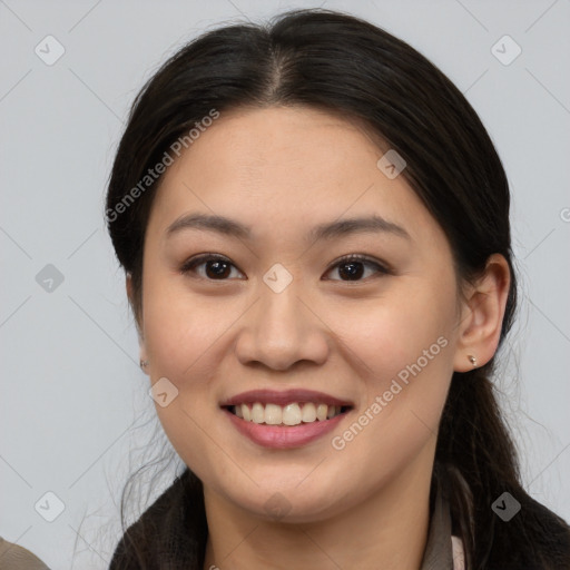 Joyful white young-adult female with long  brown hair and brown eyes