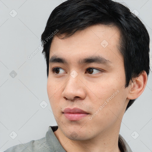 Neutral asian young-adult male with short  black hair and brown eyes