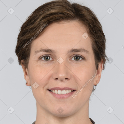 Joyful white young-adult female with short  brown hair and grey eyes