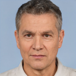 Joyful white middle-aged male with short  brown hair and brown eyes