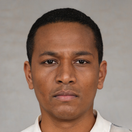 Neutral black young-adult male with short  brown hair and brown eyes
