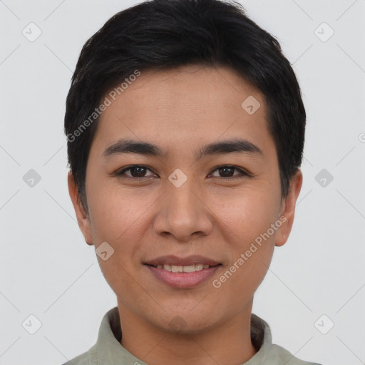 Joyful asian young-adult male with short  black hair and brown eyes