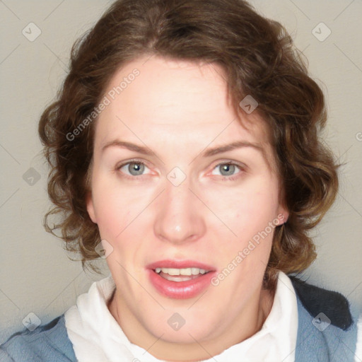 Joyful white young-adult female with medium  brown hair and blue eyes