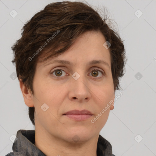 Joyful white adult female with short  brown hair and brown eyes