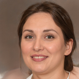 Joyful white adult female with medium  brown hair and brown eyes