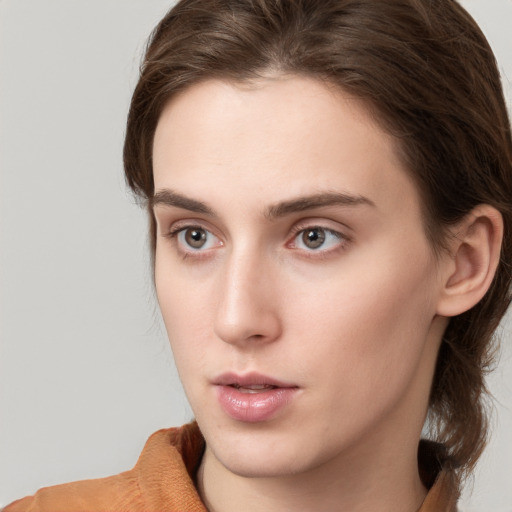 Neutral white young-adult female with medium  brown hair and brown eyes