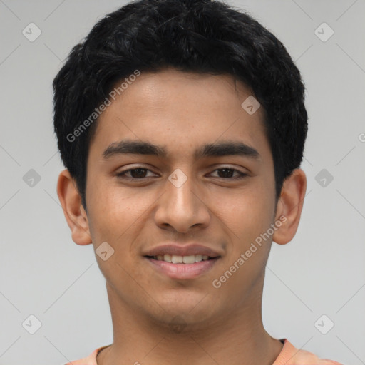 Joyful latino young-adult male with short  black hair and brown eyes