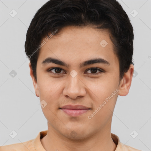 Joyful asian young-adult male with short  brown hair and brown eyes