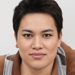 Joyful asian young-adult female with short  brown hair and brown eyes