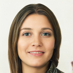 Joyful white young-adult female with long  brown hair and green eyes