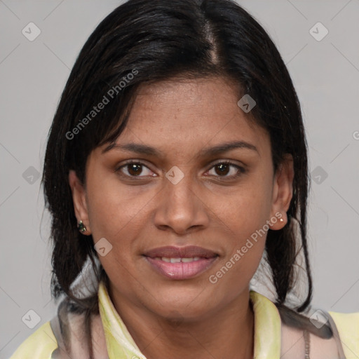 Joyful latino young-adult female with medium  brown hair and brown eyes