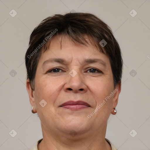 Joyful white adult female with short  brown hair and brown eyes