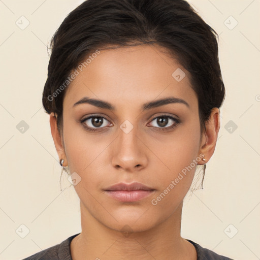 Neutral white young-adult female with long  brown hair and brown eyes