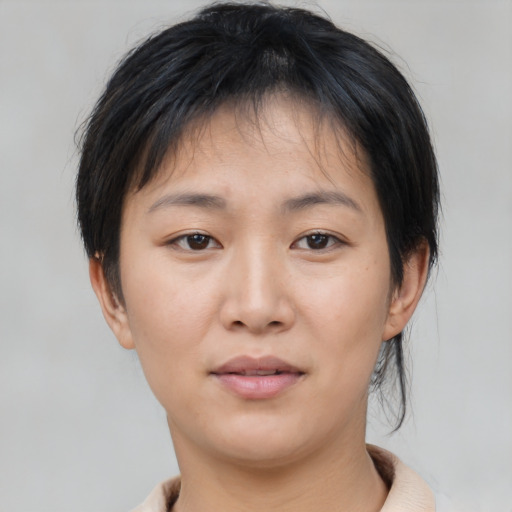 Neutral asian young-adult female with short  brown hair and brown eyes