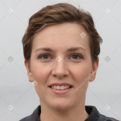 Joyful white young-adult female with short  brown hair and grey eyes