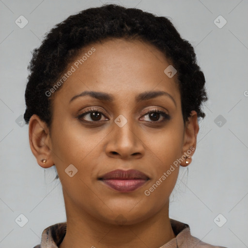 Joyful black young-adult female with short  brown hair and brown eyes