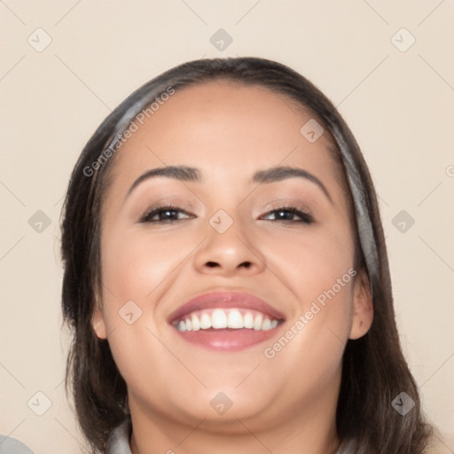 Joyful white young-adult female with medium  black hair and brown eyes