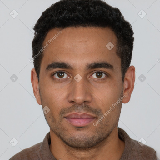 Neutral latino young-adult male with short  black hair and brown eyes