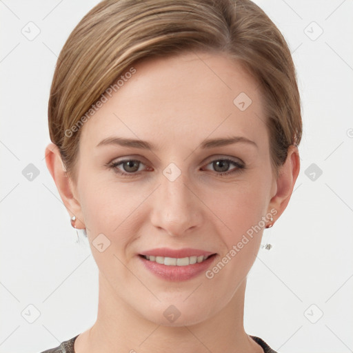 Joyful white young-adult female with short  brown hair and grey eyes