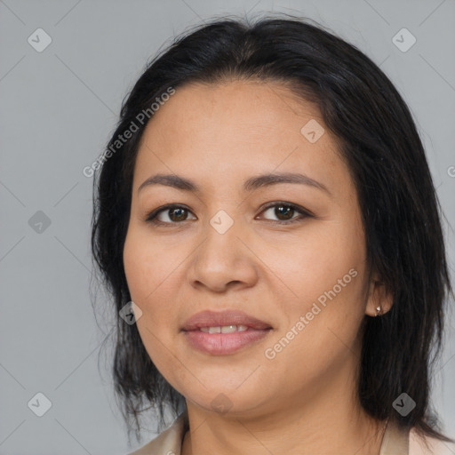 Joyful asian young-adult female with medium  black hair and brown eyes