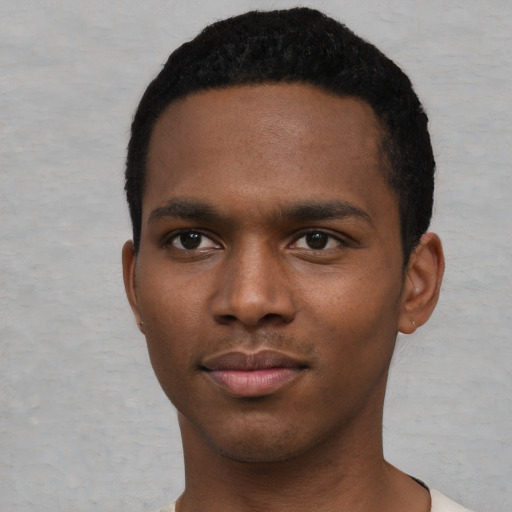 Neutral black young-adult male with short  black hair and brown eyes