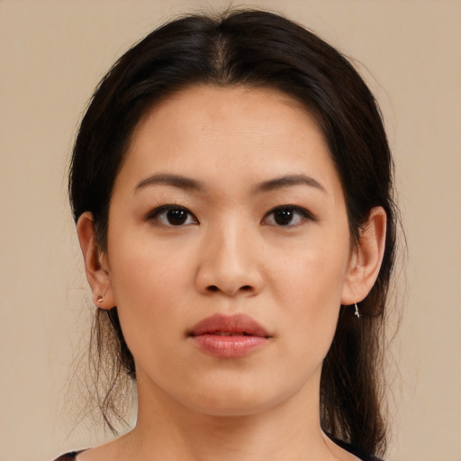 Neutral asian young-adult female with medium  brown hair and brown eyes