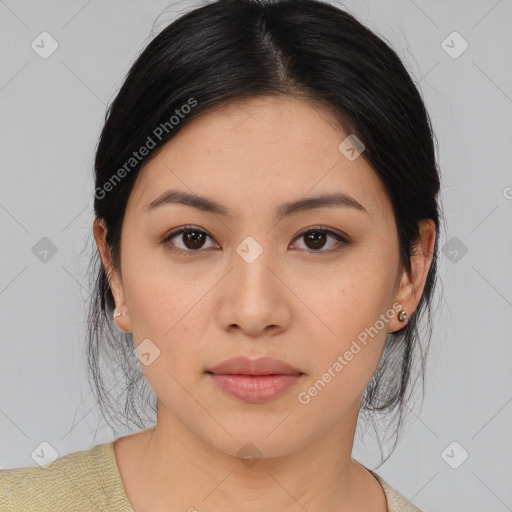 Joyful asian young-adult female with medium  black hair and brown eyes