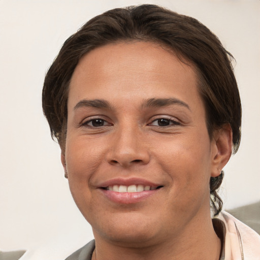 Joyful white young-adult female with short  brown hair and brown eyes