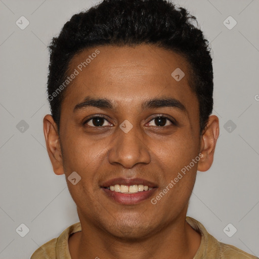 Joyful black young-adult male with short  brown hair and brown eyes