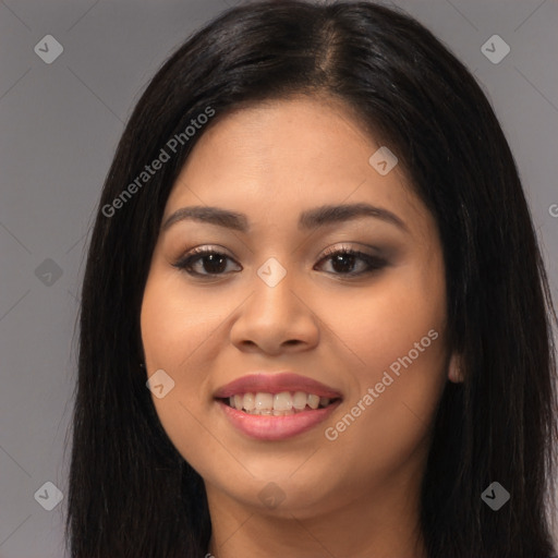 Joyful latino young-adult female with long  brown hair and brown eyes