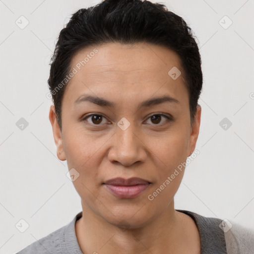 Joyful latino young-adult female with short  black hair and brown eyes