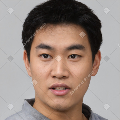 Neutral asian young-adult male with short  black hair and brown eyes