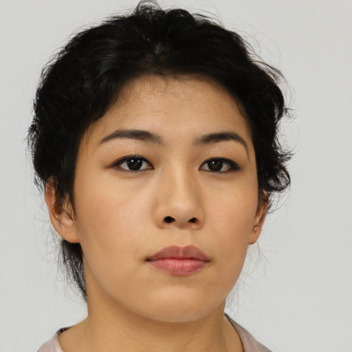 Neutral asian young-adult female with medium  brown hair and brown eyes