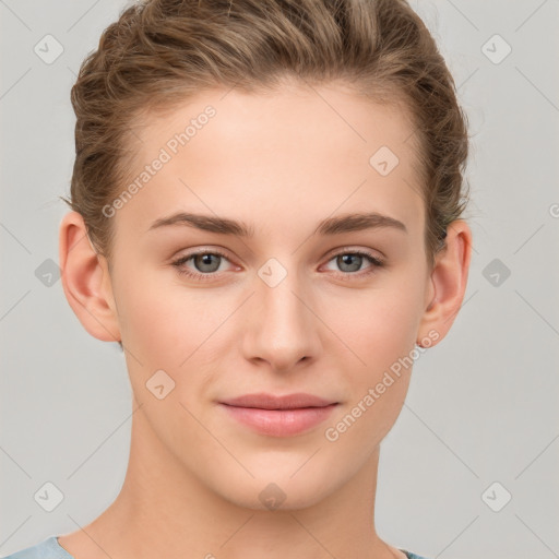 Joyful white young-adult female with short  brown hair and grey eyes