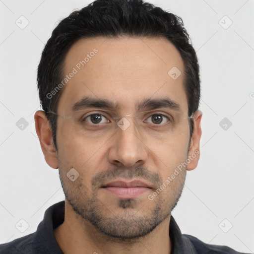 Neutral white young-adult male with short  black hair and brown eyes