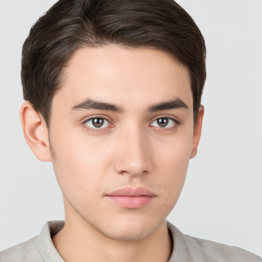 Neutral white young-adult male with short  brown hair and brown eyes