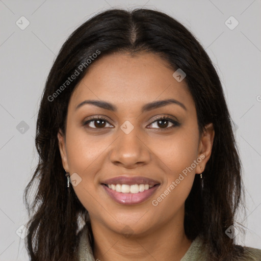 Joyful latino young-adult female with long  brown hair and brown eyes