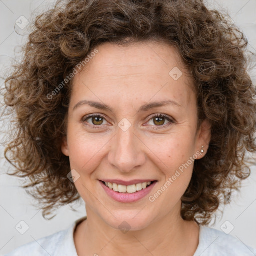 Joyful white young-adult female with medium  brown hair and green eyes