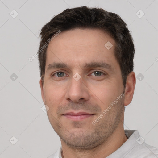 Neutral white adult male with short  brown hair and brown eyes