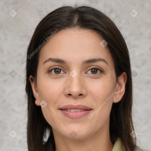 Joyful white young-adult female with long  brown hair and brown eyes