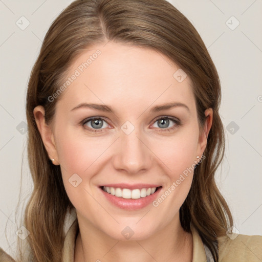 Joyful white young-adult female with long  brown hair and blue eyes