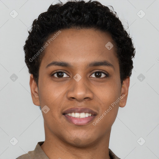 Joyful black young-adult male with short  brown hair and brown eyes